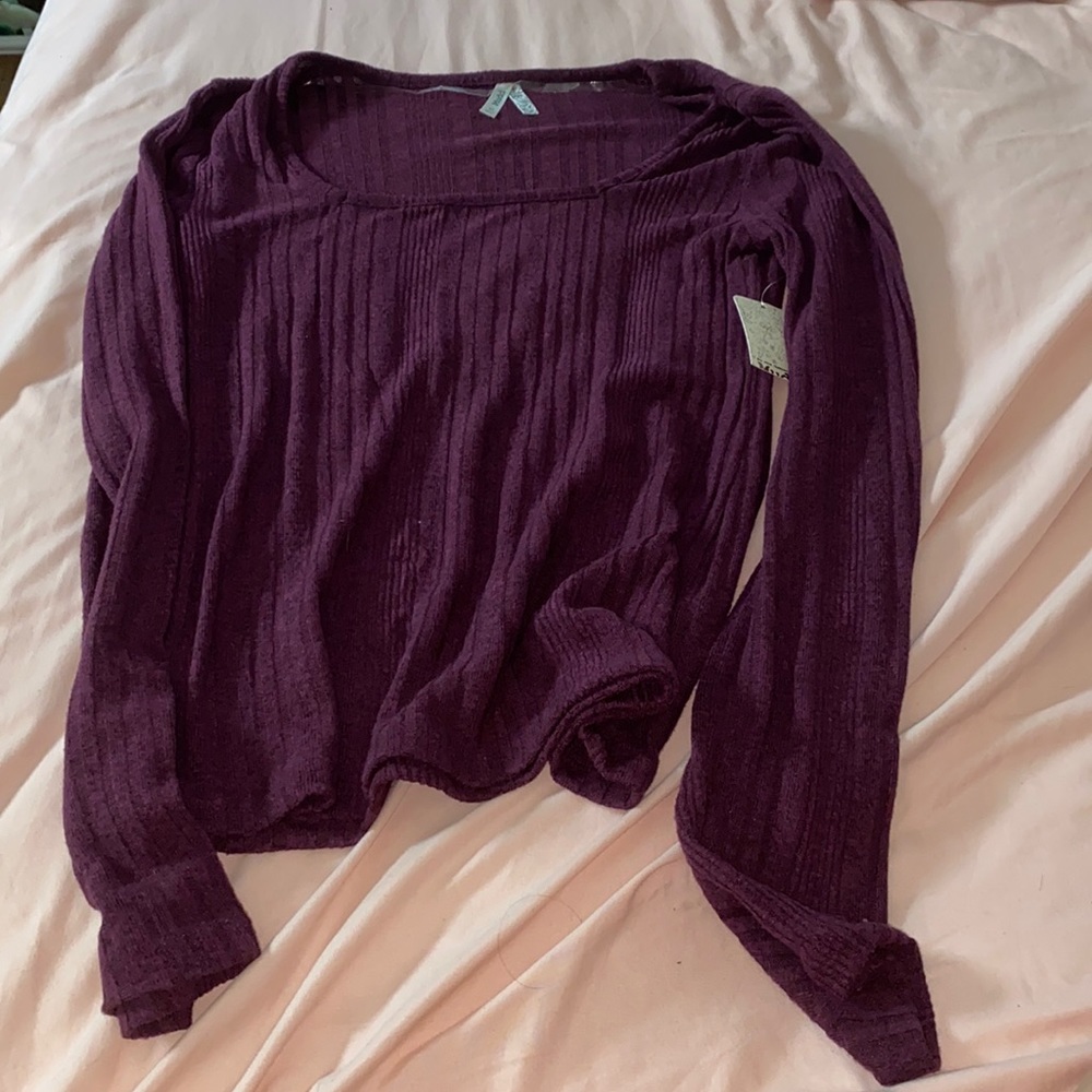 Maroon long sleeve shirt.